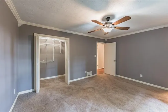 a bathroom with a shower and toilet
