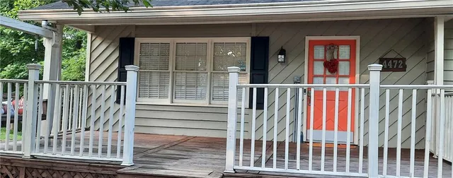 a view of a house with a porch