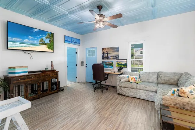 a kitchen with stainless steel appliances a refrigerator and a stove top oven