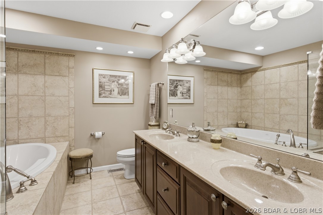 1484 Cedar Village Road Osage Beach, MO 65065 - Photo 25 of 47 Walk-in Shower Jetted Tub