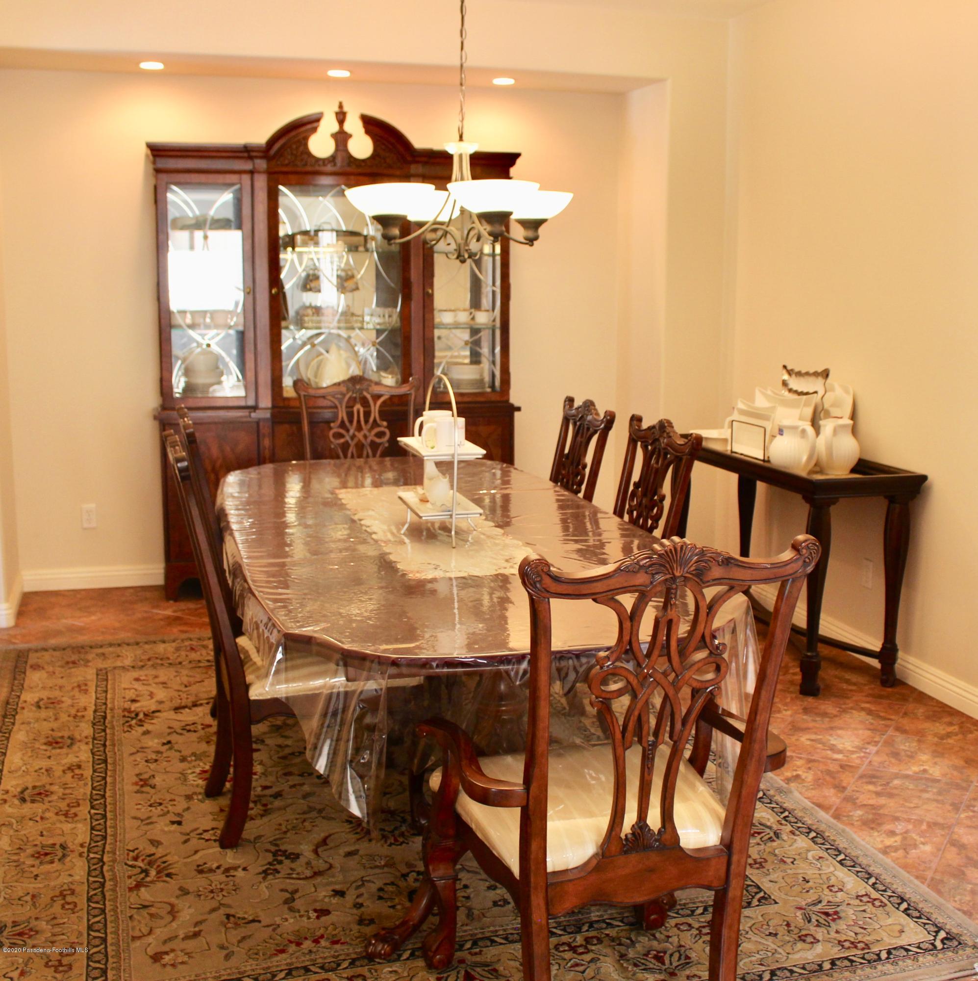 4345 Cloudywing Road Hemet, CA 92545 - Photo 4 of 18 a view of a dining room with furniture and window