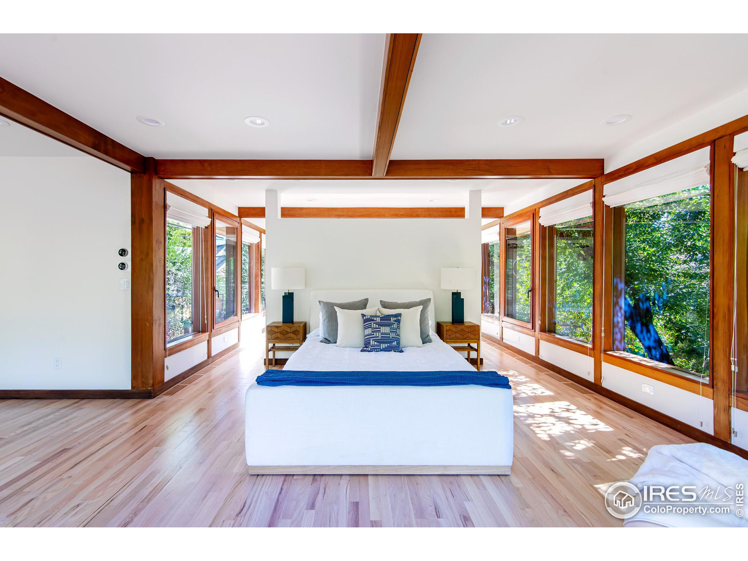 2323 4th Street Boulder, CO 80302 - Photo 20 of 40 a living room with large window and furniture