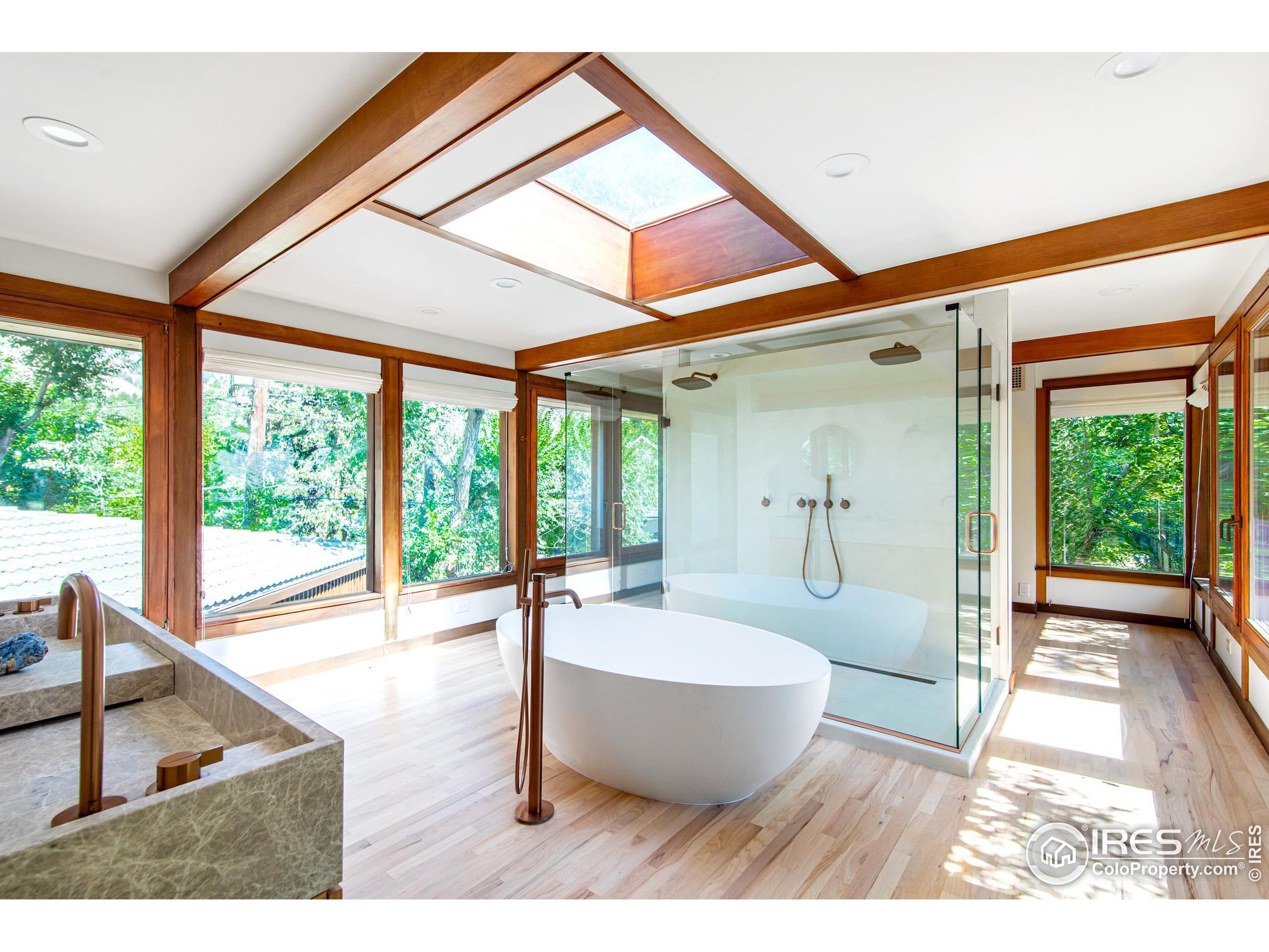 2323 4th Street Boulder, CO 80302 - Photo 9 of 40 a spacious bathroom with a tub and sink
