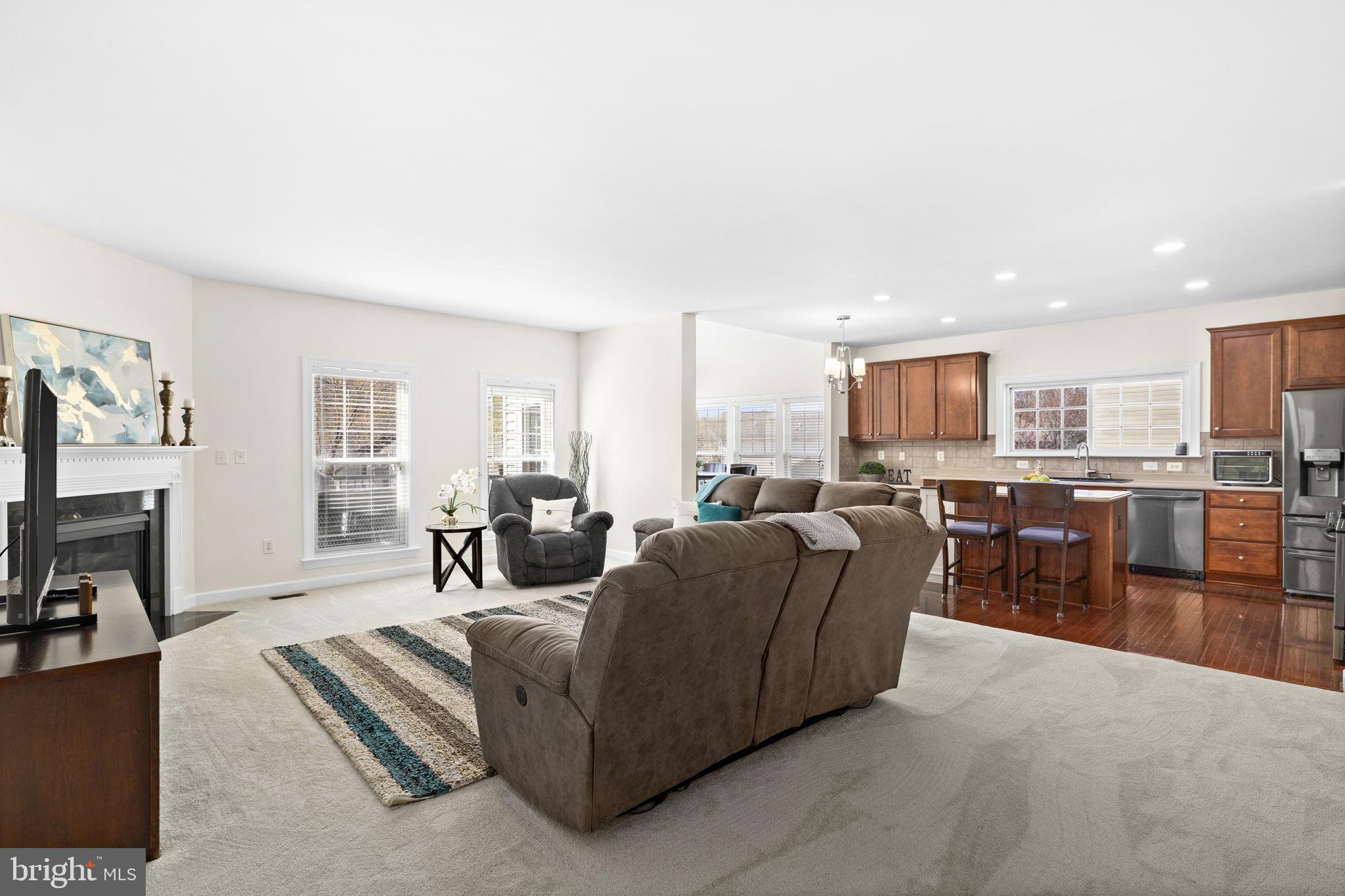 4185 Agency Loop Triangle, VA 22172 - Photo 19 of 46 a living room with furniture and a table