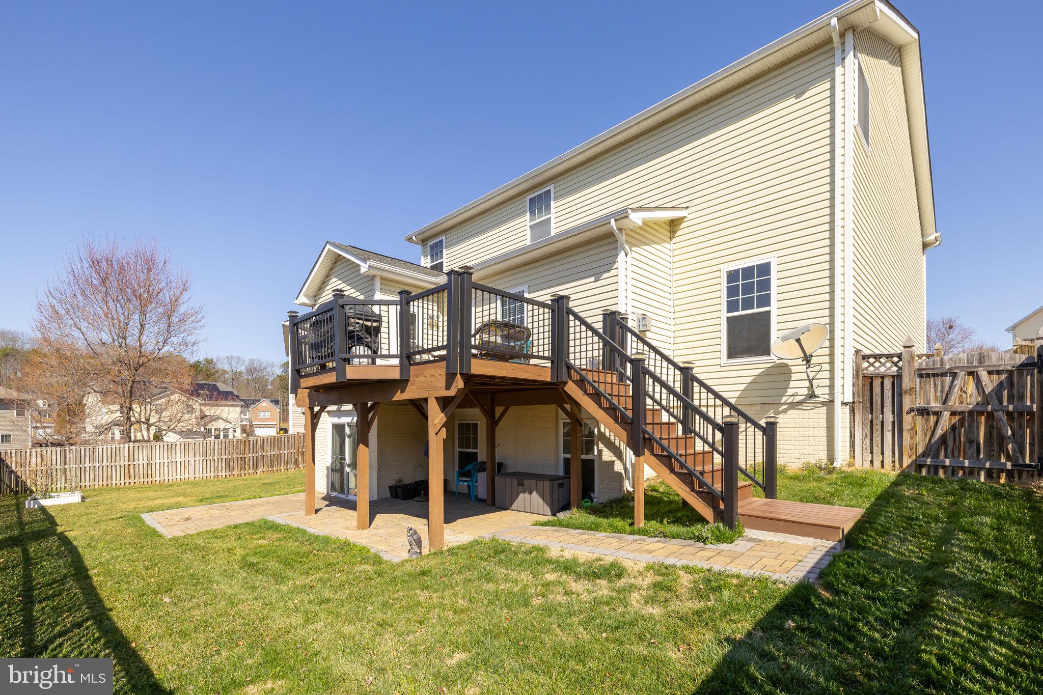 4185 Agency Loop Triangle, VA 22172 - Photo 7 of 46 a view of a house with a yard