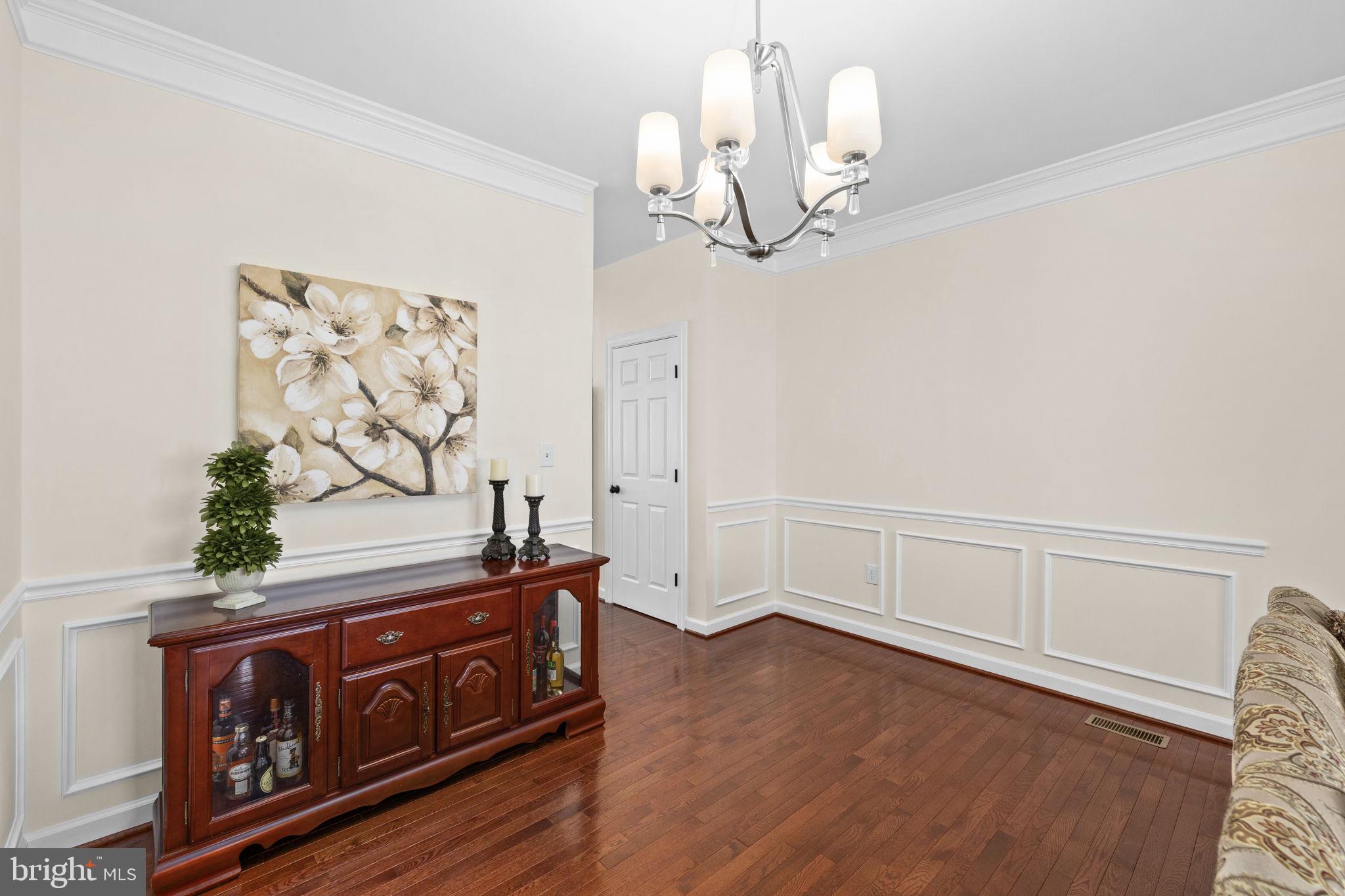 4185 Agency Loop Triangle, VA 22172 - Photo 10 of 46 a view of a room with wooden floor