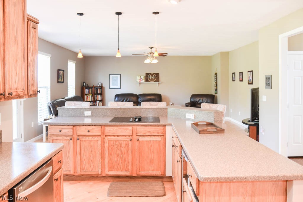 4356 Aylesford Road Uniontown, OH 44685 - Photo 8 of 31 The kitchen overlooks the great room.