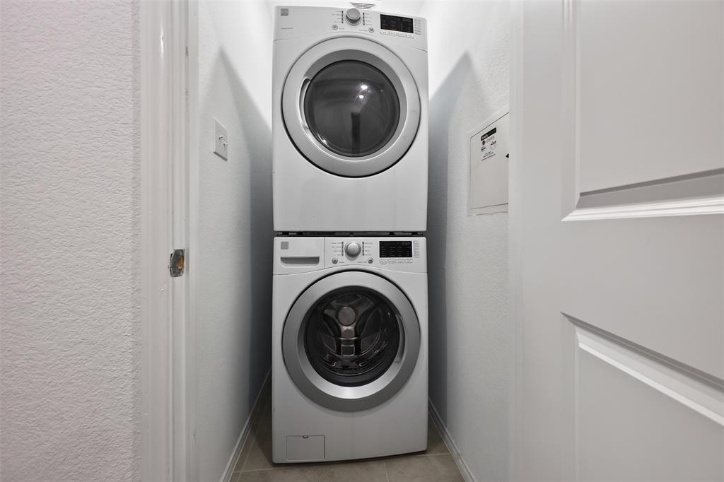 464 Reverie Way Ferris, TX 75125 - Photo 25 of 36 White stackable washer and dryer appliances