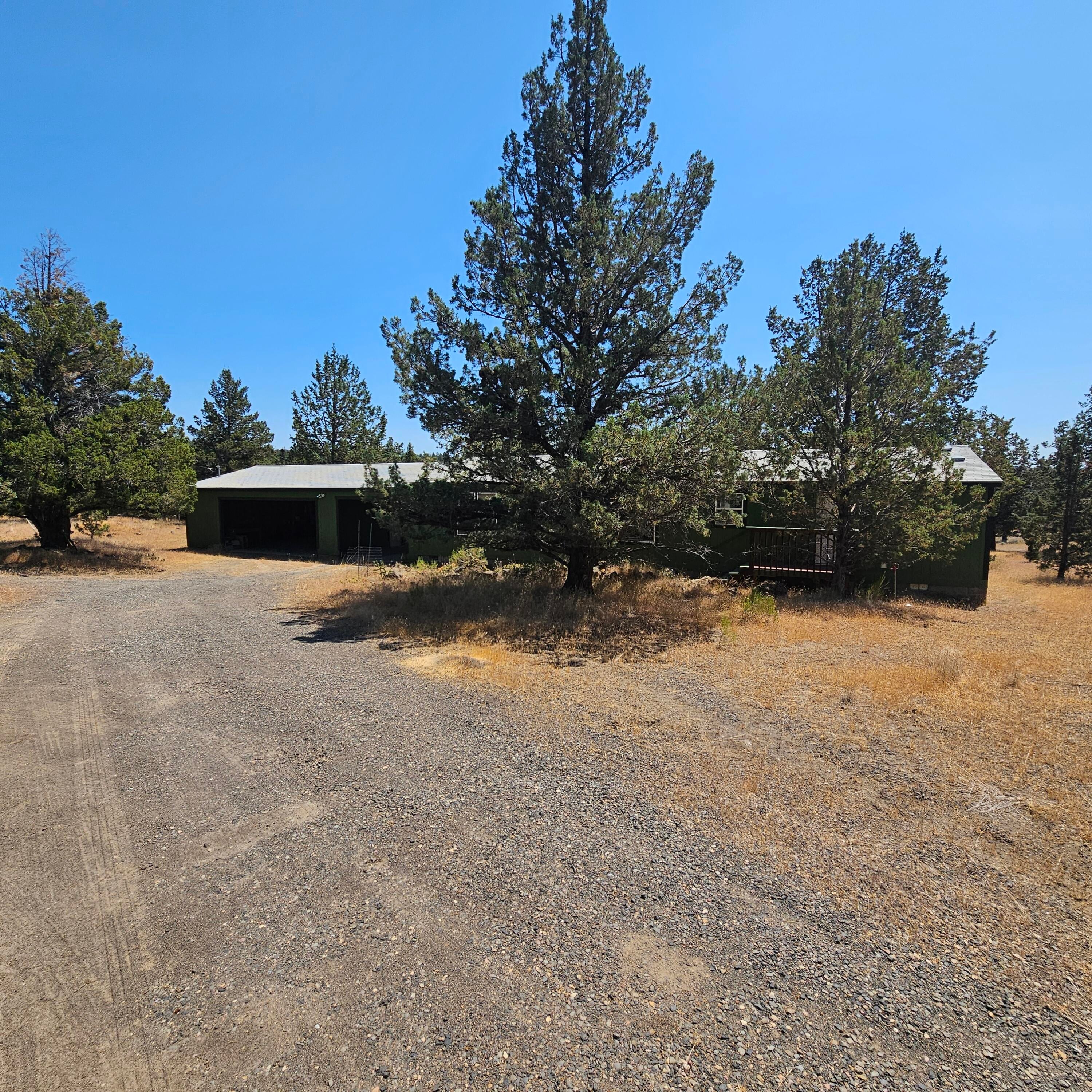 14165 Southwest Ridge Place Terrebonne, OR 97760 - Photo 1 of 23 Front Elevation