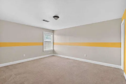 a view of an empty room with window