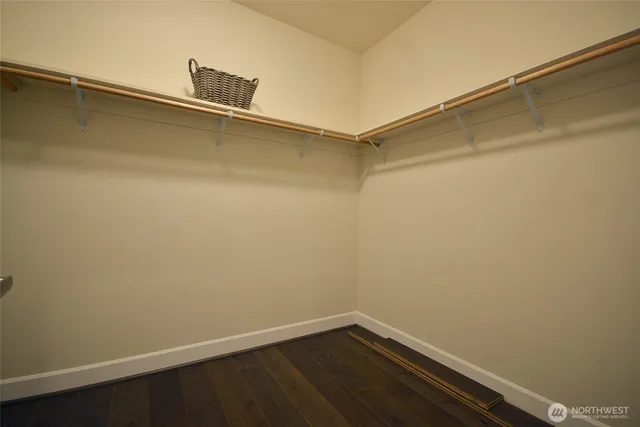 a view of a room with shelf on the wall