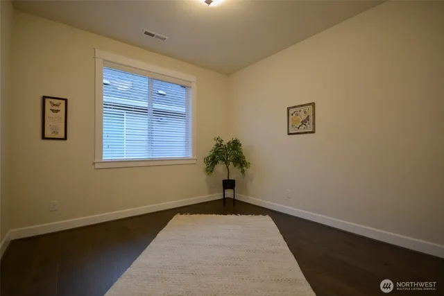 a view of empty room with a window