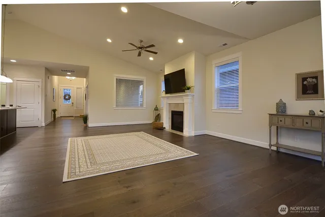 a view of livingroom with hardwood floor and a fireplace