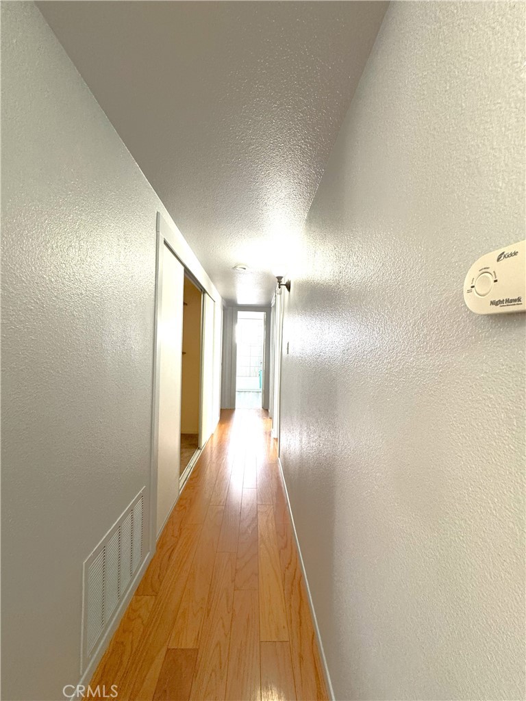 543 Weiman Avenue Ridgecrest, CA 93555 - Photo 11 of 37 a view of gallery with wooden floor