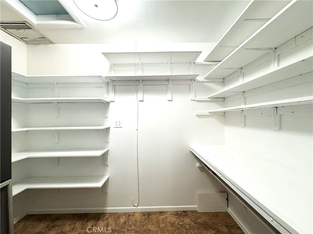 543 Weiman Avenue Ridgecrest, CA 93555 - Photo 8 of 37 a view of a room with racks on the wall