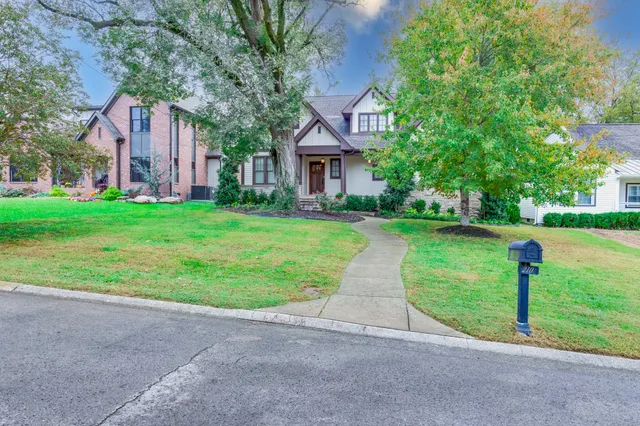 a house with garden in front of it