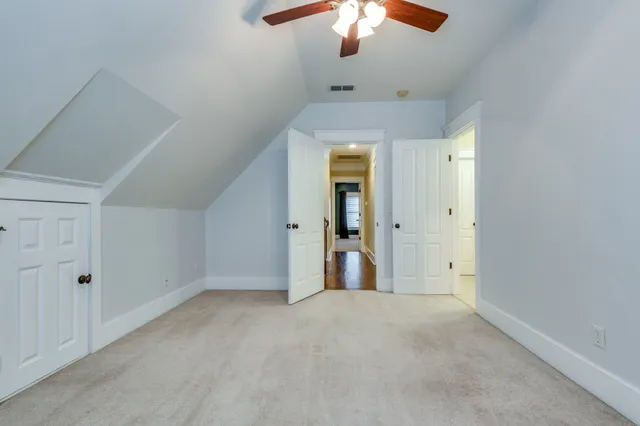 a view of a hallway with closet