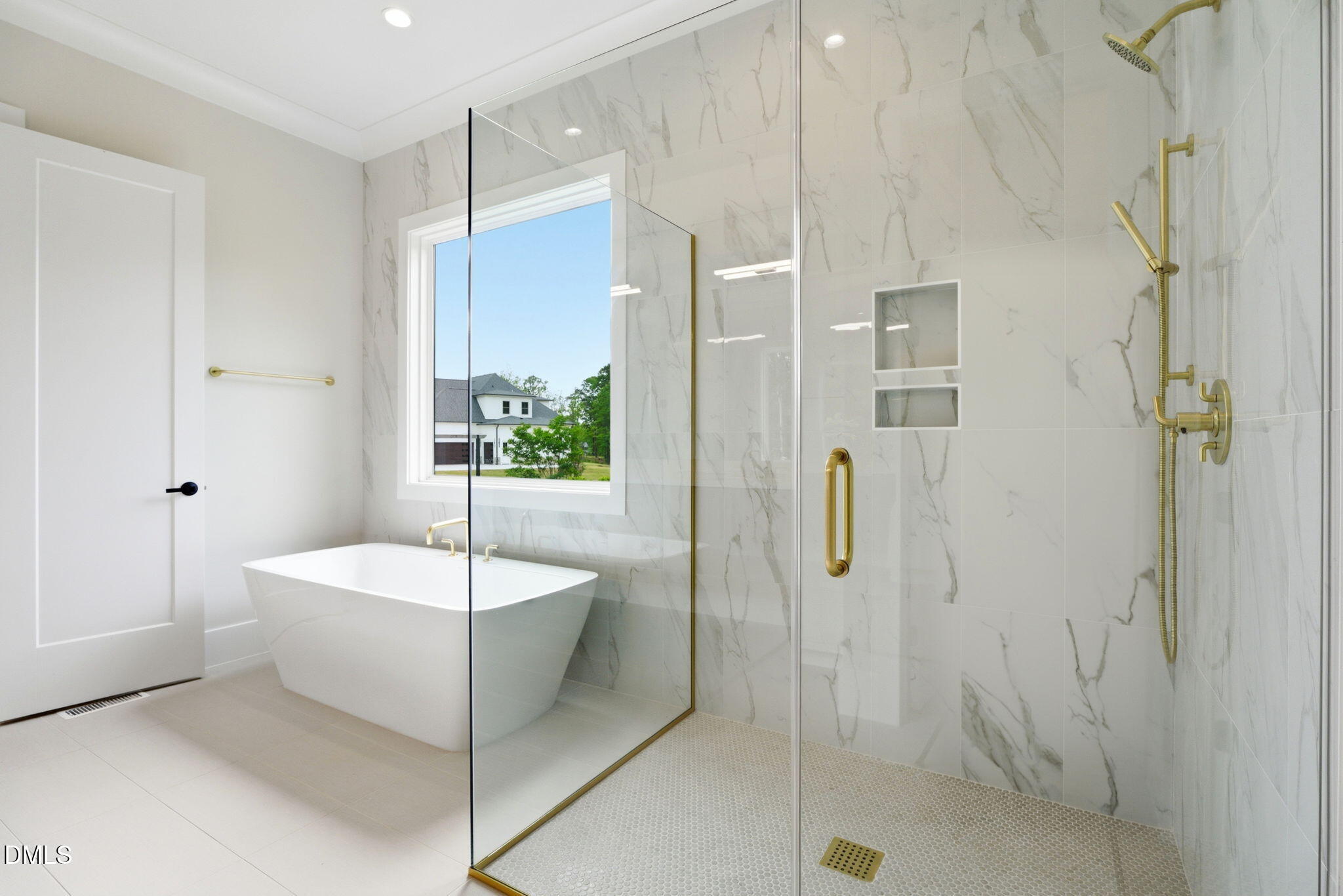 1304 Sanctuary Pond Drive Raleigh, NC 27606 - Photo 21 of 52 a spacious bathroom with a shower and a sink