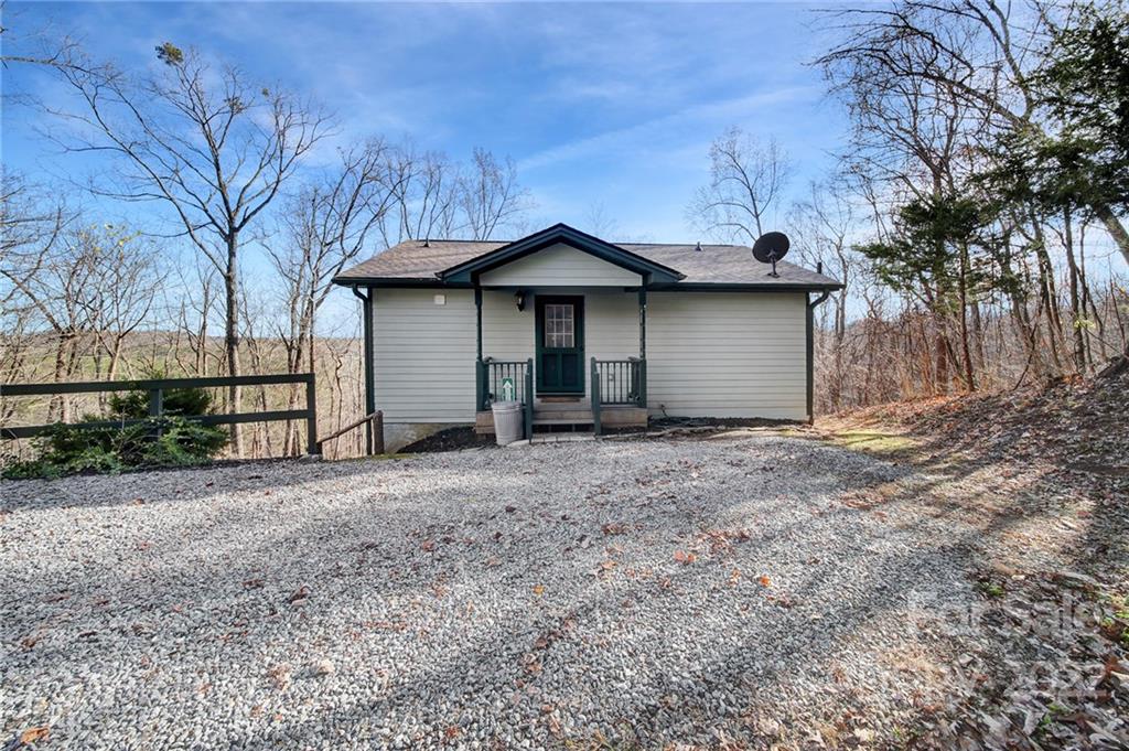 119 Celestial Way Mill Spring, NC 28756 - Photo 1 of 33 a house with a outdoor space