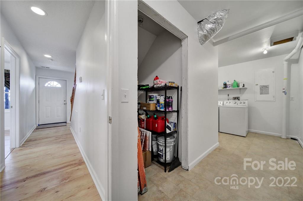 119 Celestial Way Mill Spring, NC 28756 - Photo 22 of 33 a view of a hallway with closet and a window