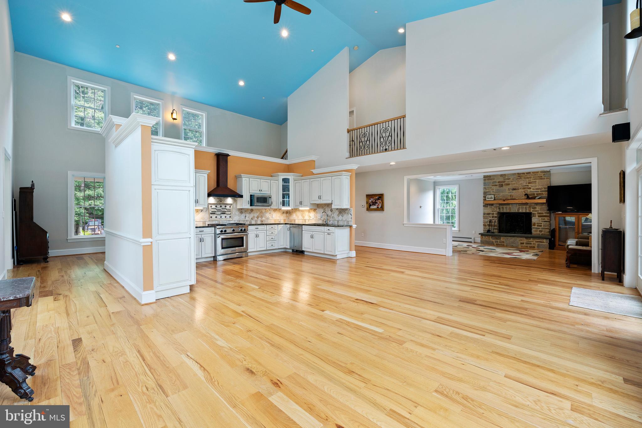 3000 Shepperd Road Monkton, MD 21111 - Photo 14 of 34 a room with stainless steel appliances wooden floor and large windows