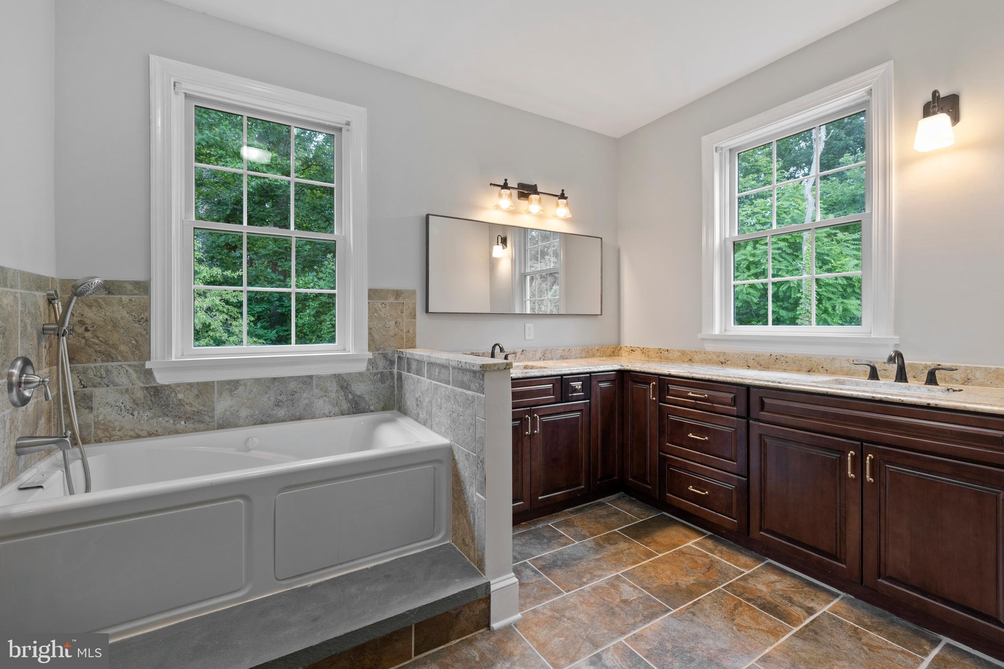 3000 Shepperd Road Monkton, MD 21111 - Photo 19 of 34 a bathroom with a tub sink and window