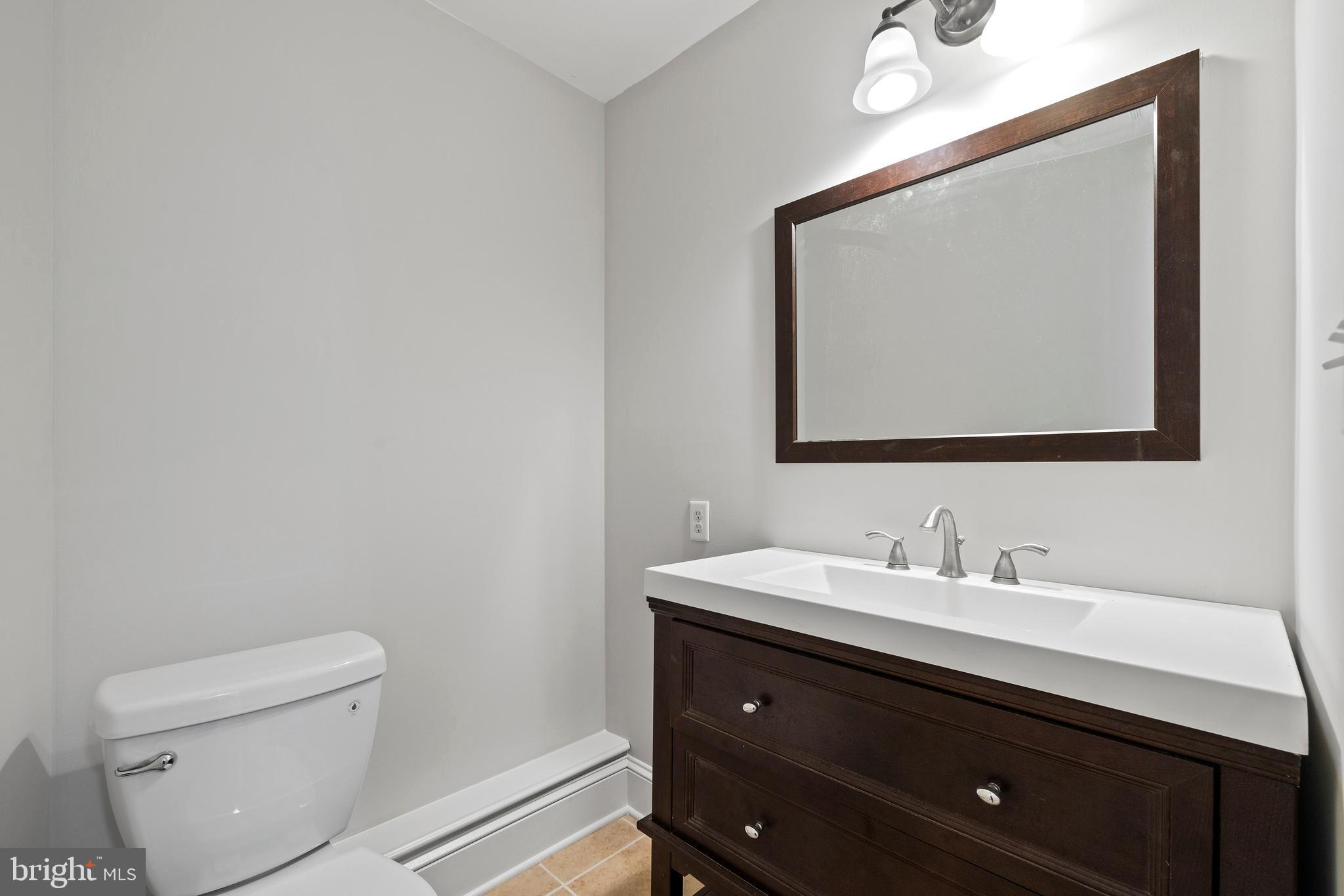 3000 Shepperd Road Monkton, MD 21111 - Photo 27 of 34 a bathroom with a toilet sink and mirror