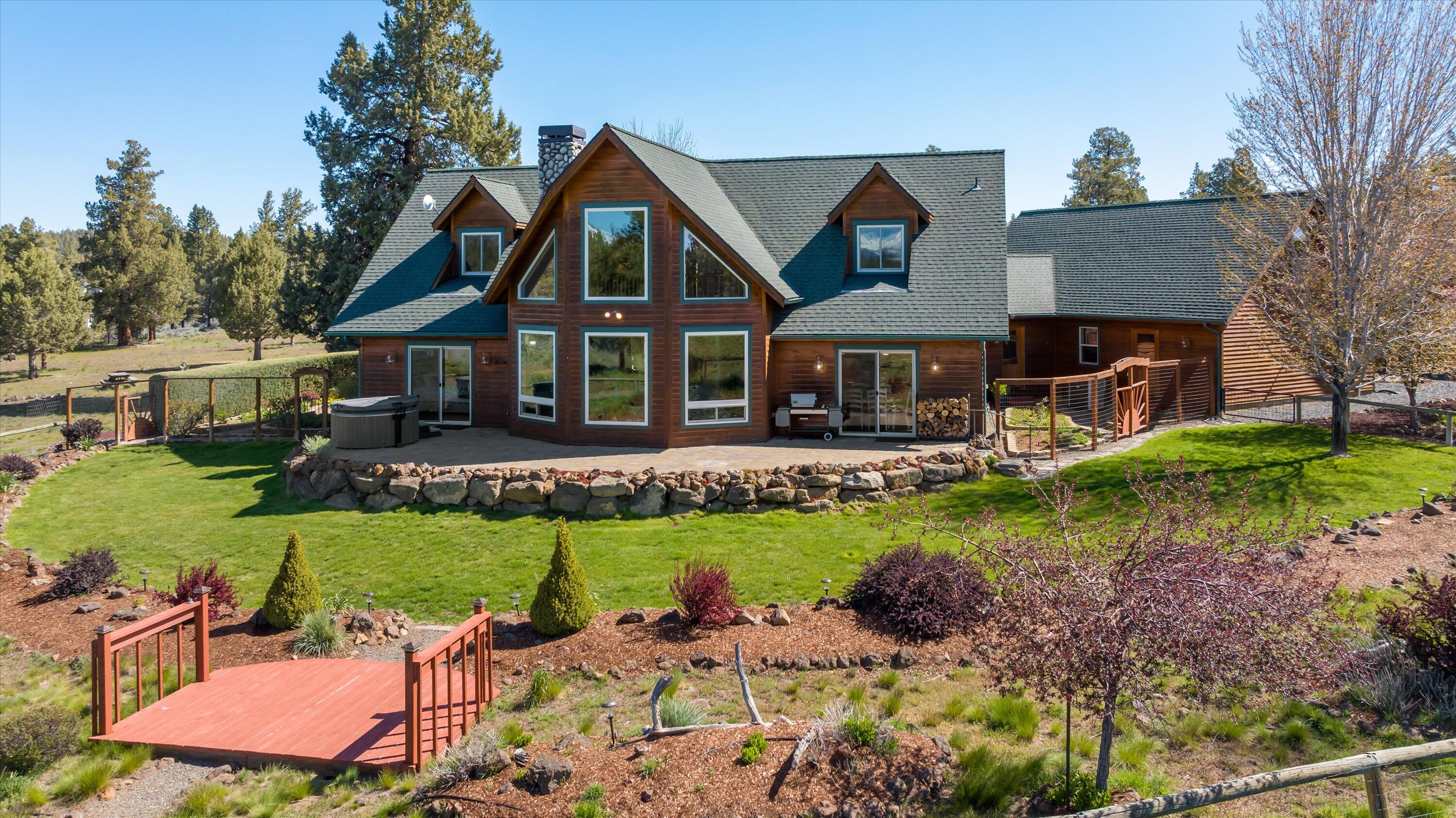 69125 Hurtley Ranch Road Sisters, OR 97759 - Photo 55 of 77 Outdoors is a fun & leisure haven, with horseshoe pit, acres of adventure, fenced fruit tree orchard, herb and English gardens adding to the sense of tranquility surrounding this truly special property.