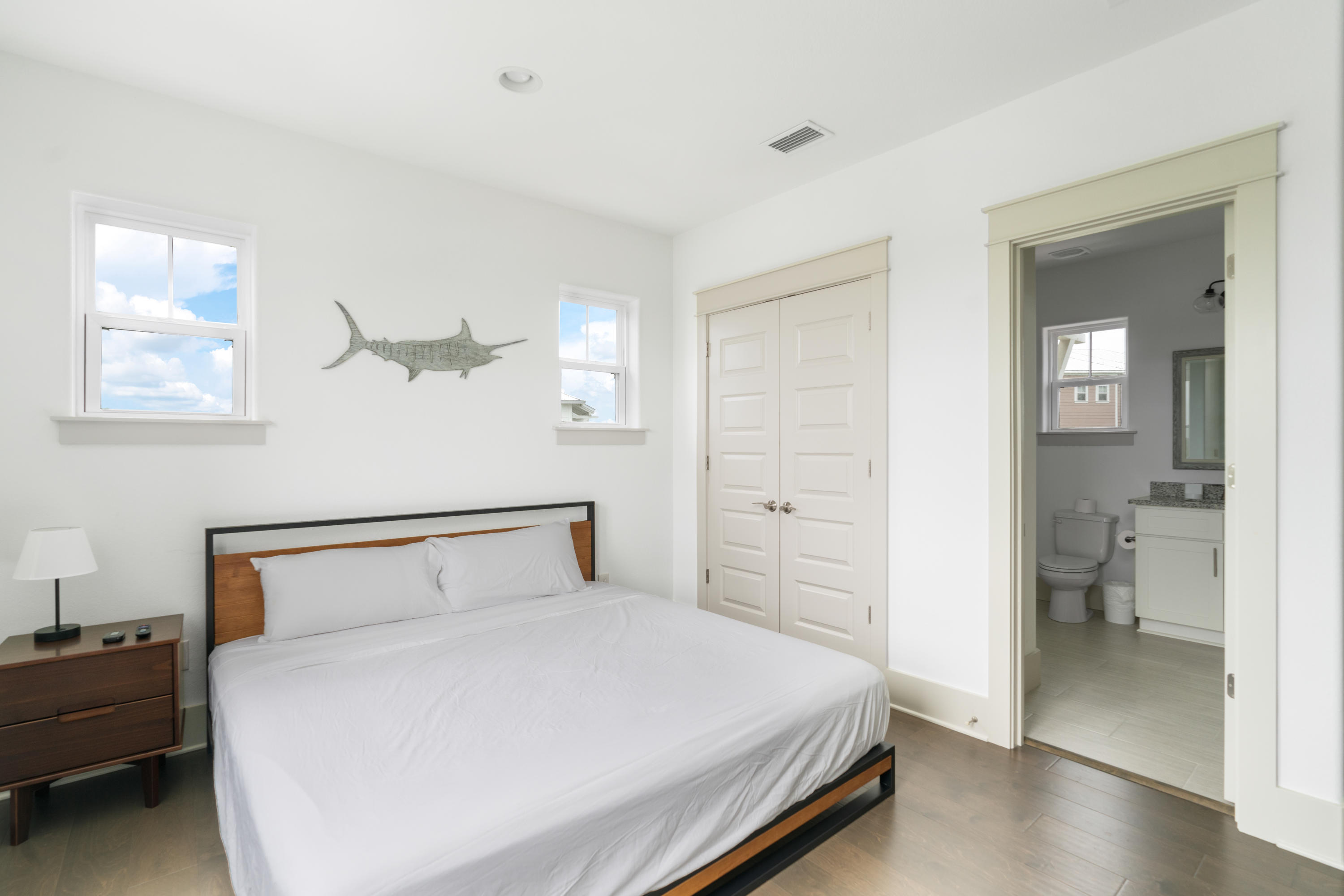 275 Gulfview Circle Santa Rosa Beach, FL 32459 - Photo 25 of 47 a bedroom with a bed and a view of bathroom