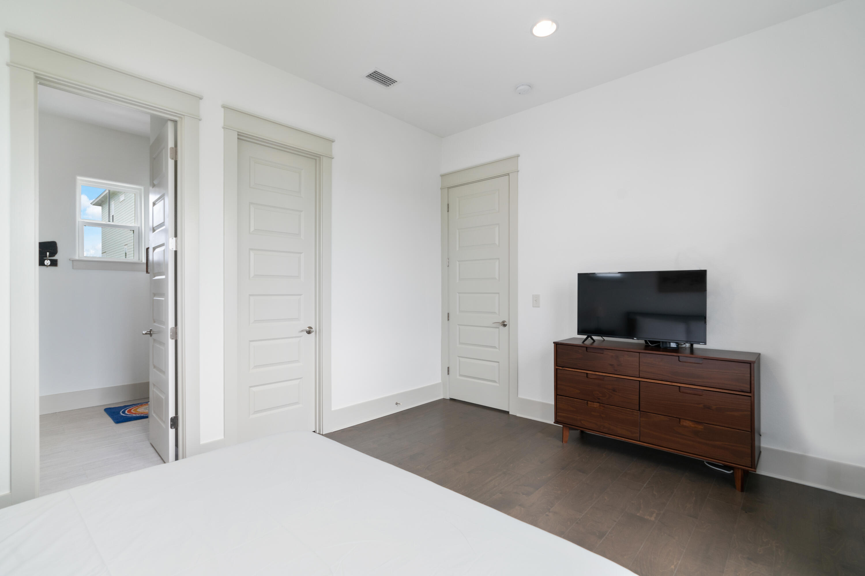 275 Gulfview Circle Santa Rosa Beach, FL 32459 - Photo 28 of 47 a living room with furniture and a flat screen tv