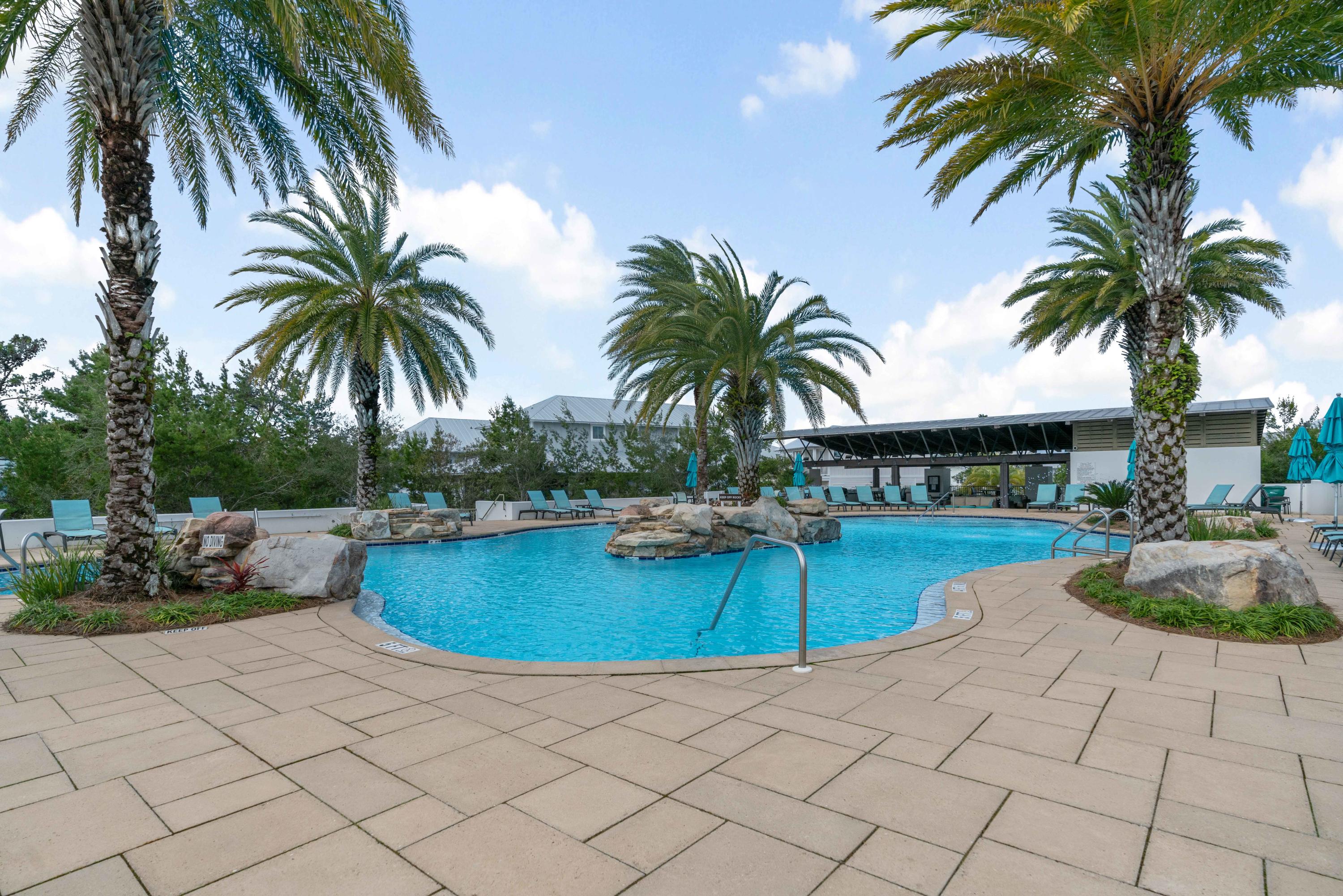 275 Gulfview Circle Santa Rosa Beach, FL 32459 - Photo 33 of 47 a view of a swimming pool and a chair