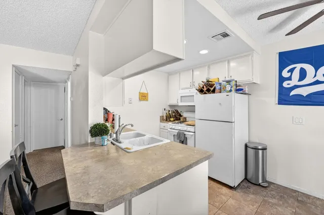 $920,000 | 48304 Stewart Drive, Unit J14, Indio, CA 92201