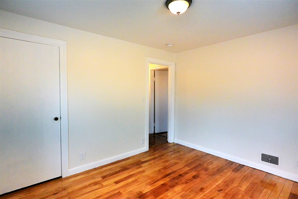 6 Arnold Road Peabody, MA 01960 - Photo 11 of 24 a view of empty room with wooden floor