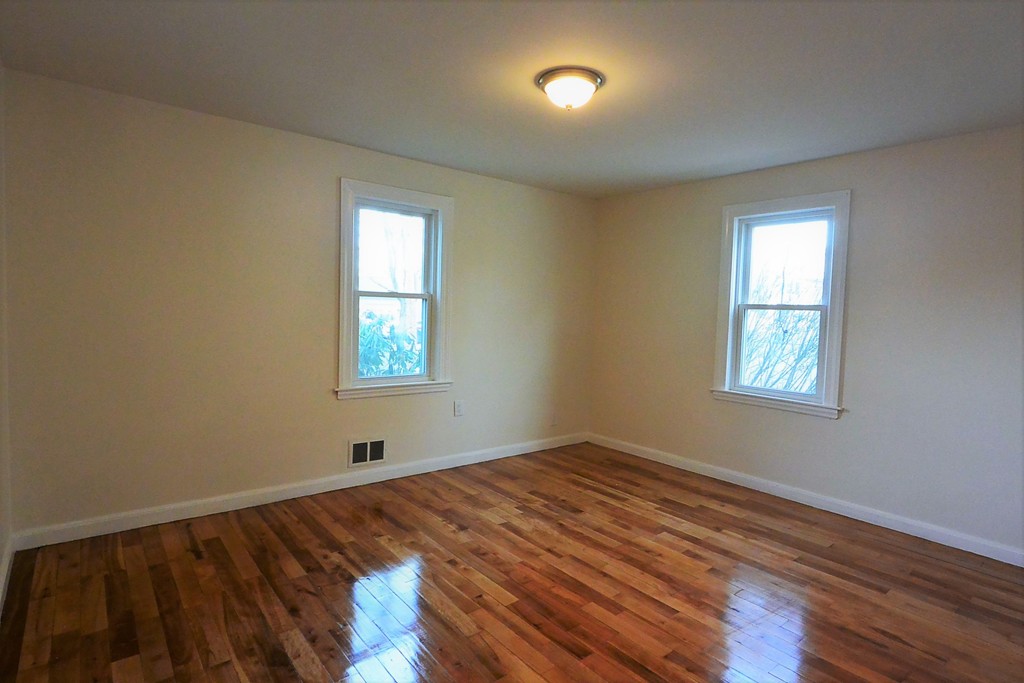 6 Arnold Road Peabody, MA 01960 - Photo 12 of 24 a view of a room with wooden floor and window