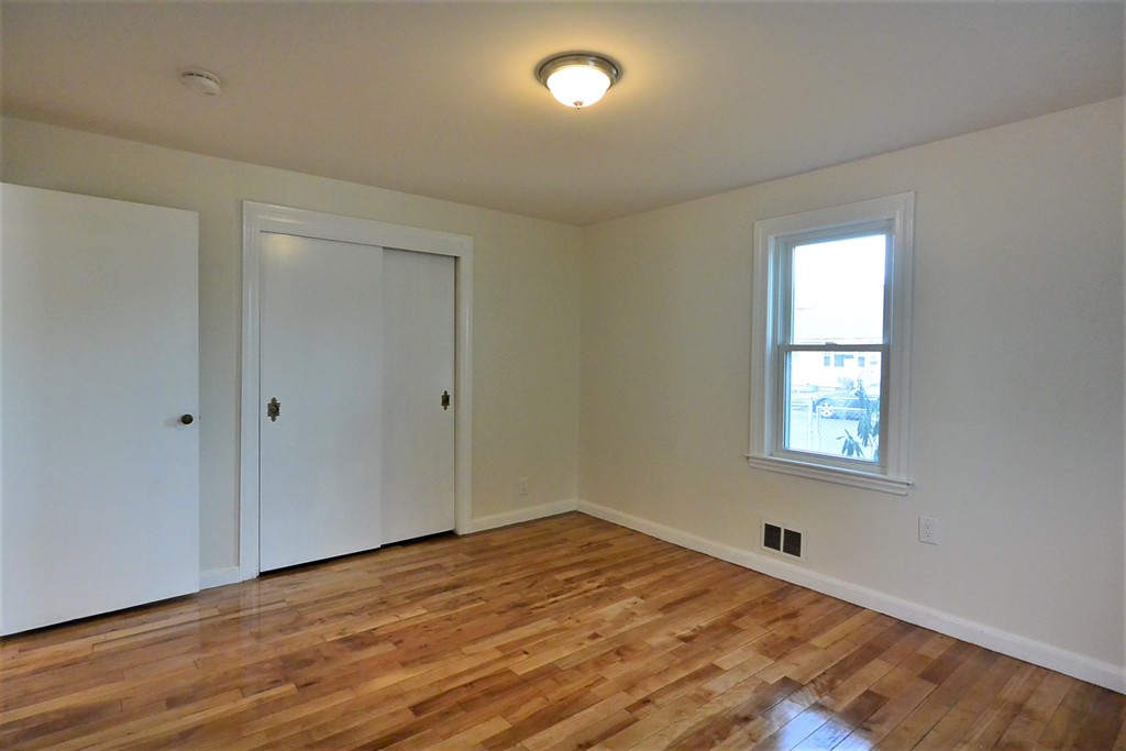 6 Arnold Road Peabody, MA 01960 - Photo 13 of 24 a view of a room that has a window in it
