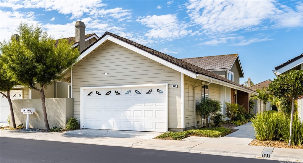 a view of a house with a street