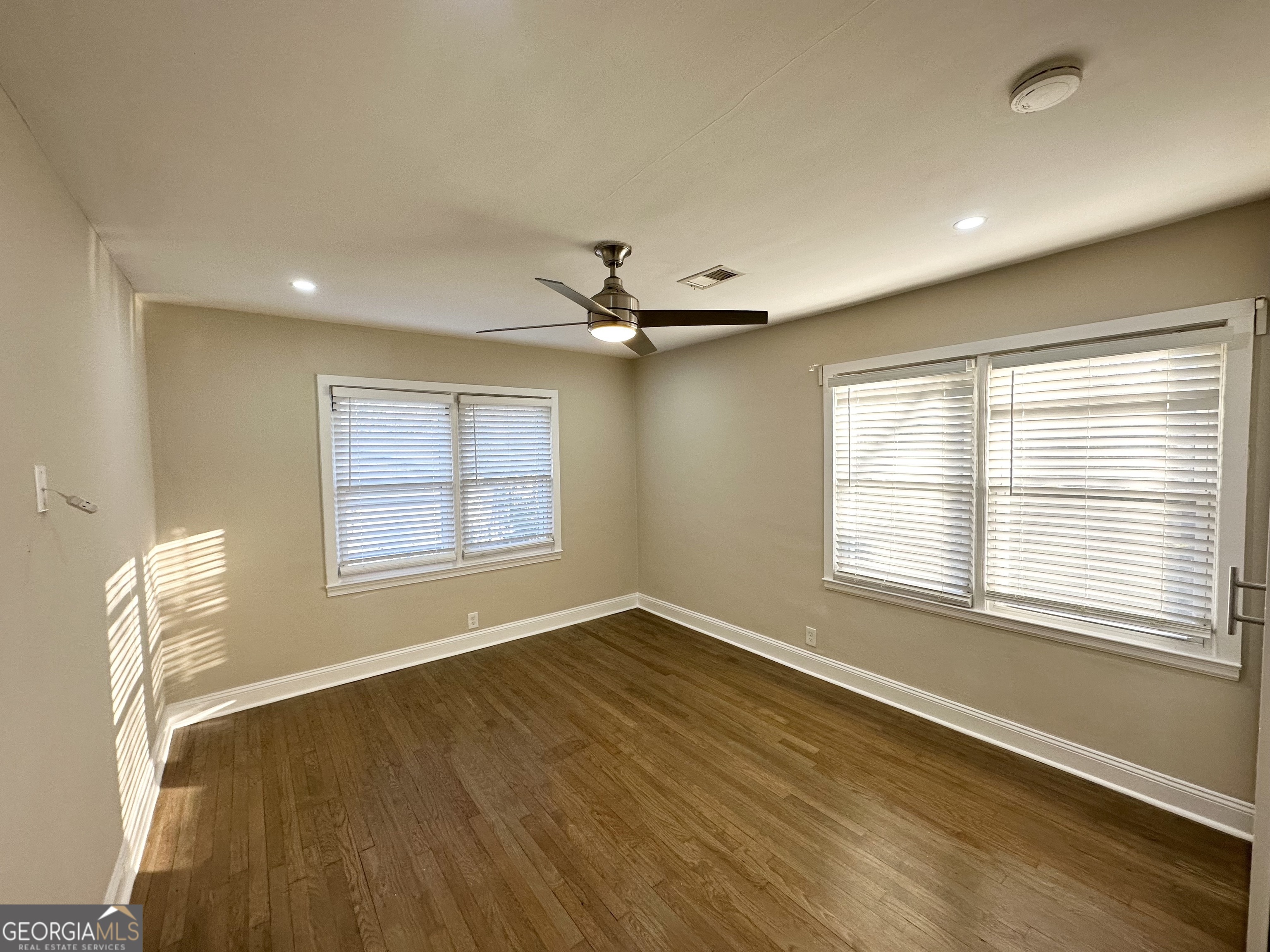 1996 Meadow Lane Decatur, GA 30032 - Photo 7 of 13 a view of an empty room with a window