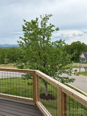 a view of a balcony with an outdoor space