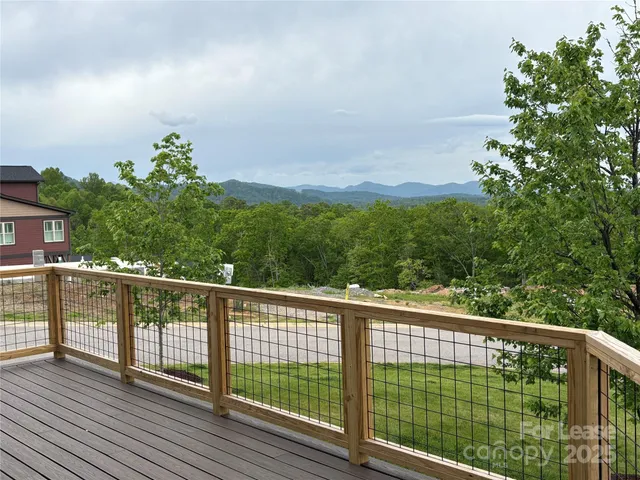 a view of a balcony with an outdoor space