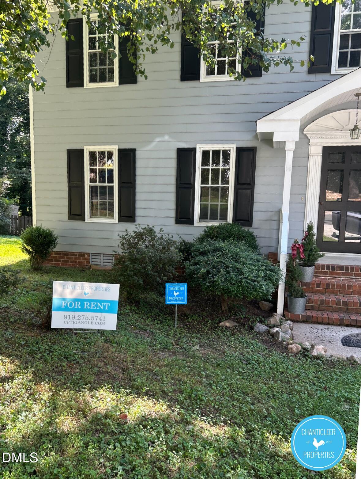 6923 Sandringham Drive Raleigh, NC 27613 - Photo 15 of 16 front view of a house with a yard