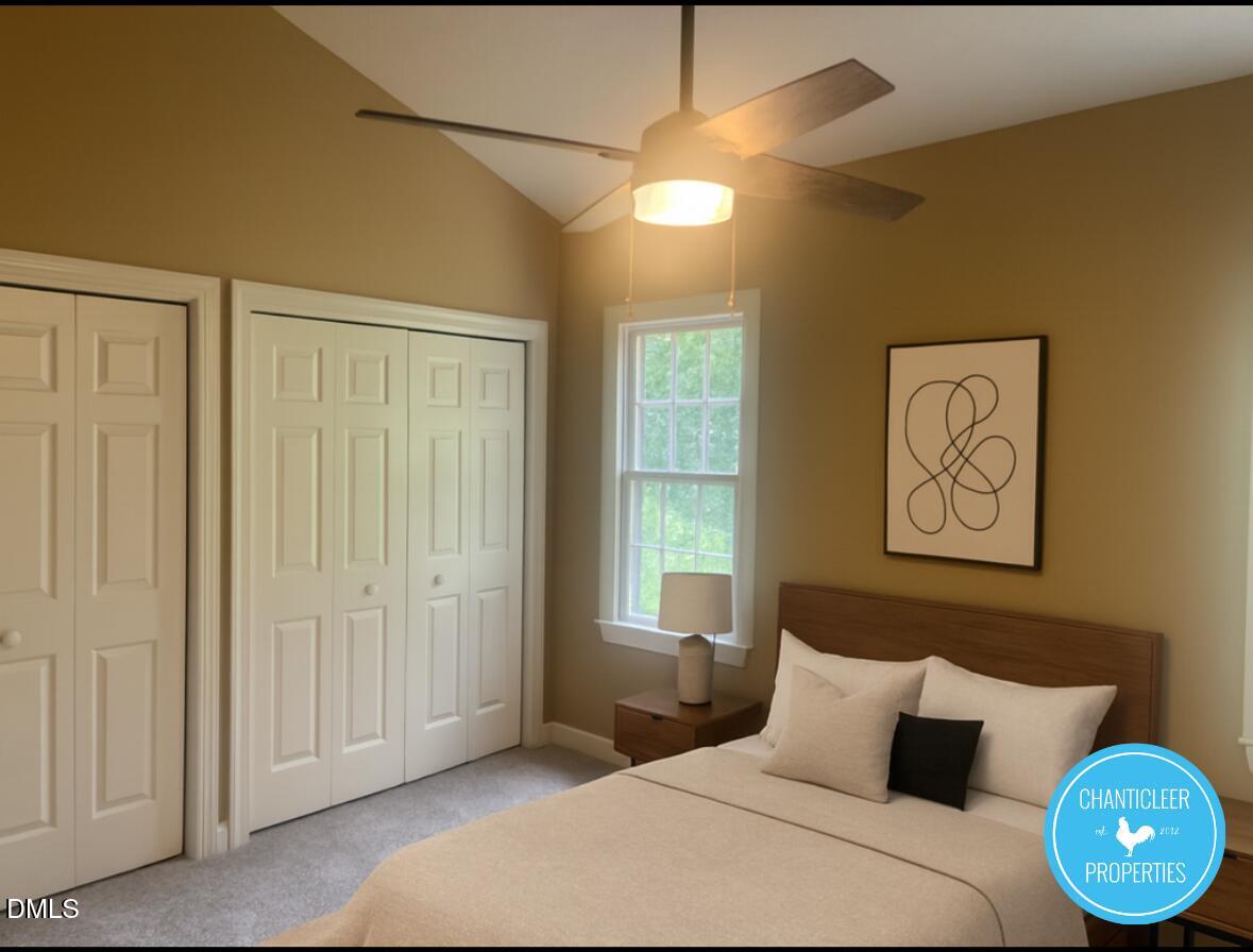 6923 Sandringham Drive Raleigh, NC 27613 - Photo 9 of 16 a bedroom with a bed and a window