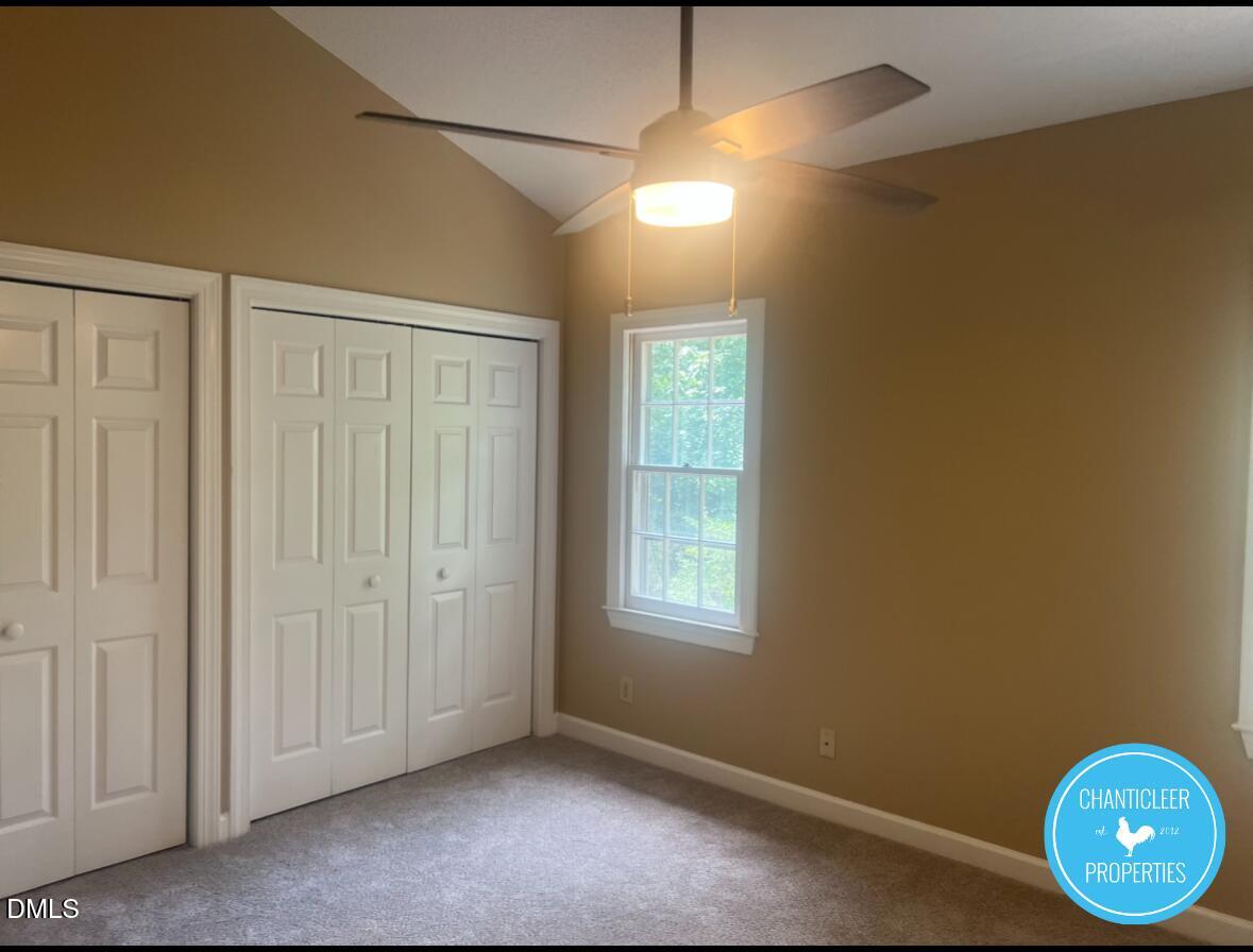 6923 Sandringham Drive Raleigh, NC 27613 - Photo 10 of 16 a view of an empty room with window and closet area