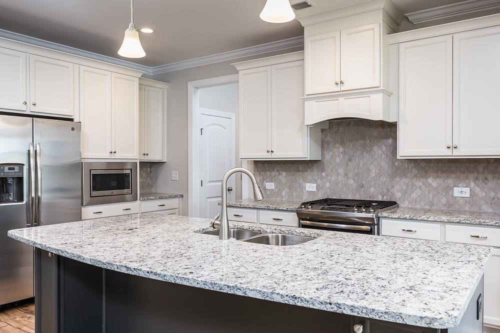 1908 Edens Ridge Avenue Wake Forest, NC 27587 - Photo 3 of 27 Center kitchen island is the heart of the home