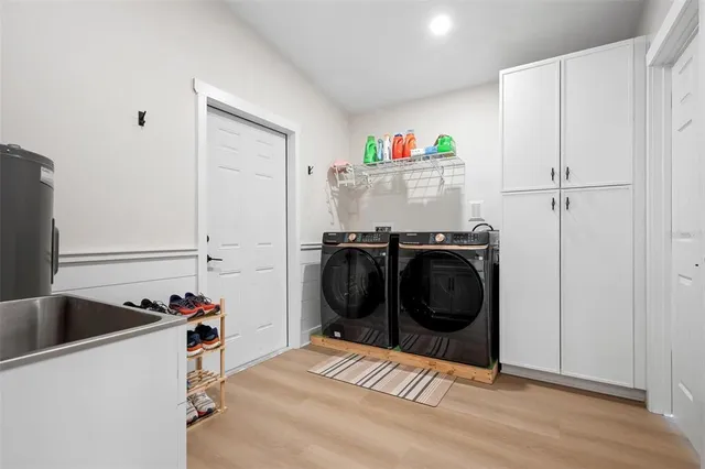 a bedroom with a bed and a night stand