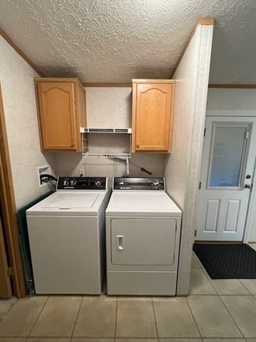 735 Memorial Drive, Unit 40 Chicopee, MA 01020 - Photo 17 of 20 a utility room with dryer and washer