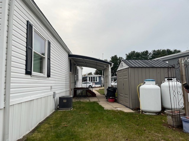 735 Memorial Drive, Unit 40 Chicopee, MA 01020 - Photo 5 of 20 a house view with a backyard space