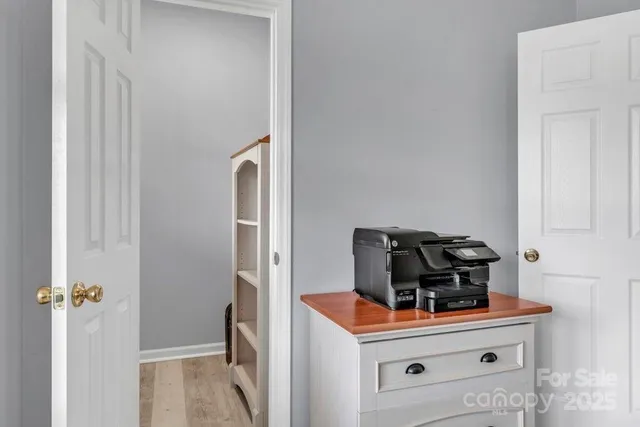 a spacious bedroom with a bed and a couch