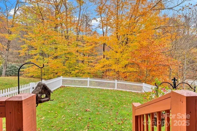 a house view with a backyard space