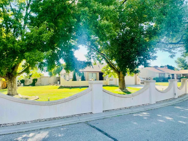 a view of a swimming pool with an outdoor space and seating area