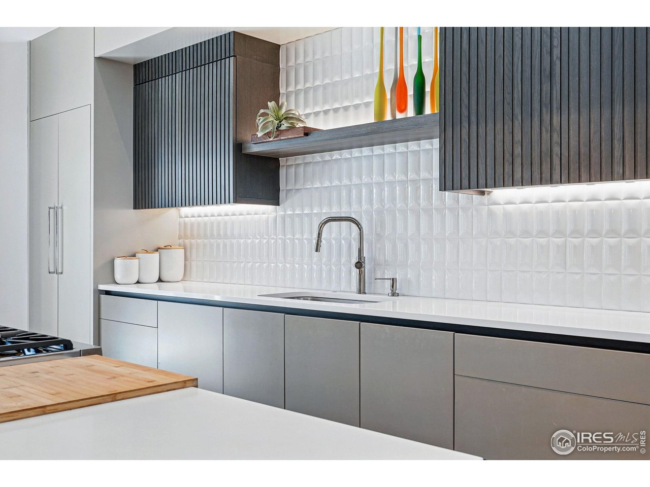 6923 Hunter Place Boulder, CO 80301 - Photo 13 of 34 a kitchen with a sink and cabinets